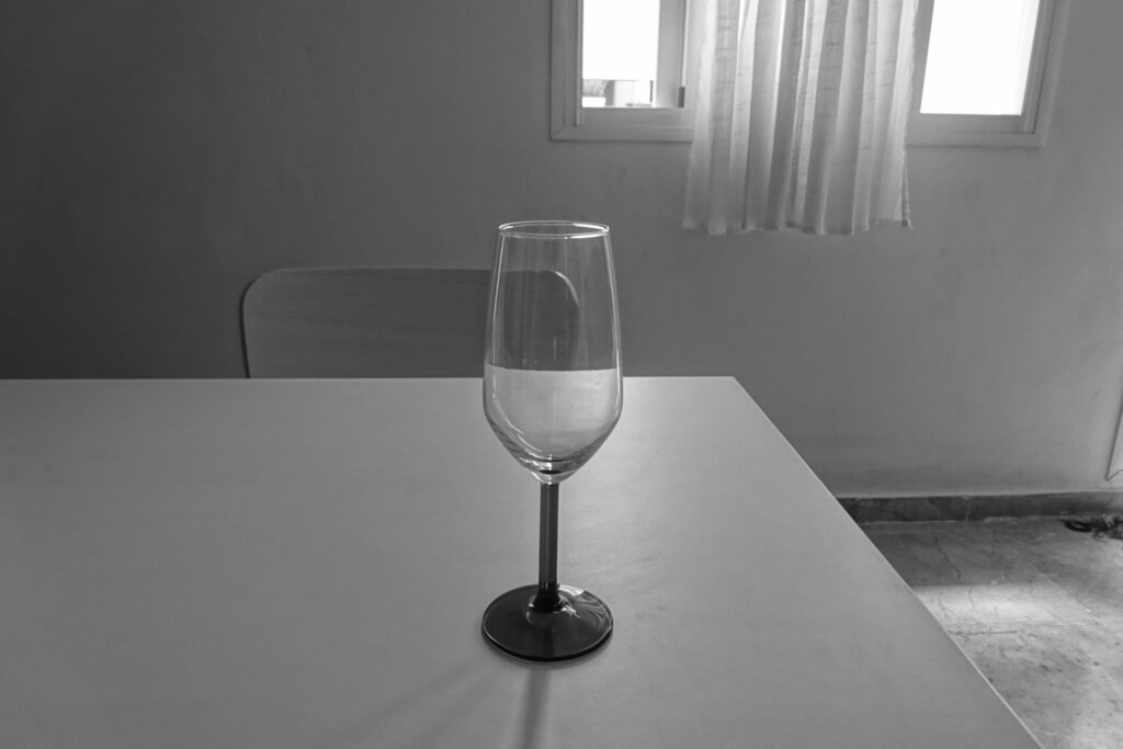 An empty glass on the table.